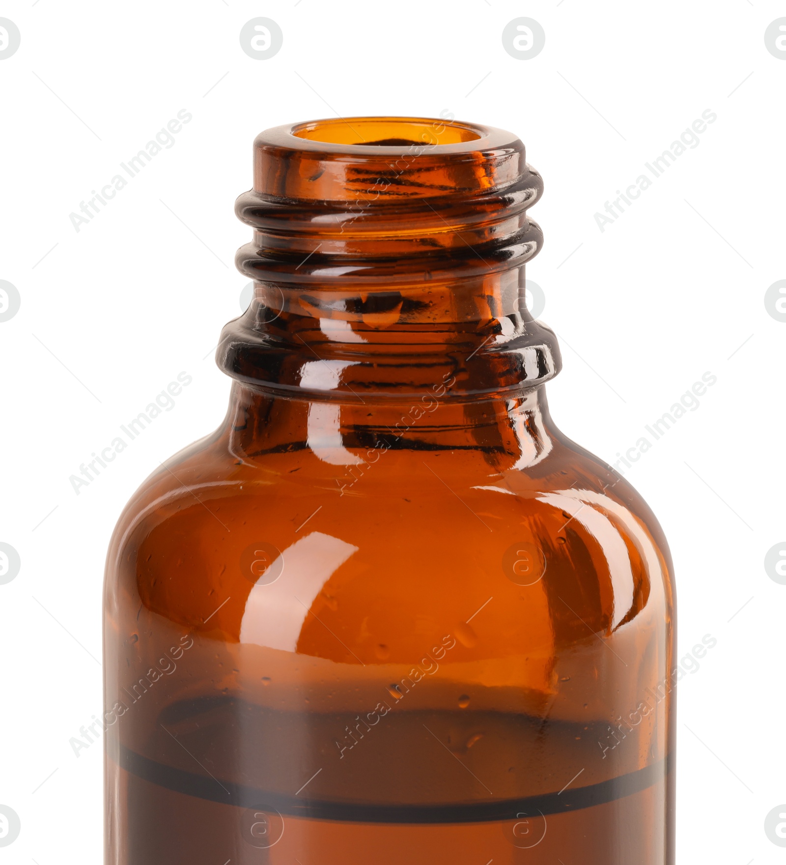 Photo of Bottle of essential oil isolated on white