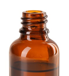 Photo of Bottle of essential oil isolated on white