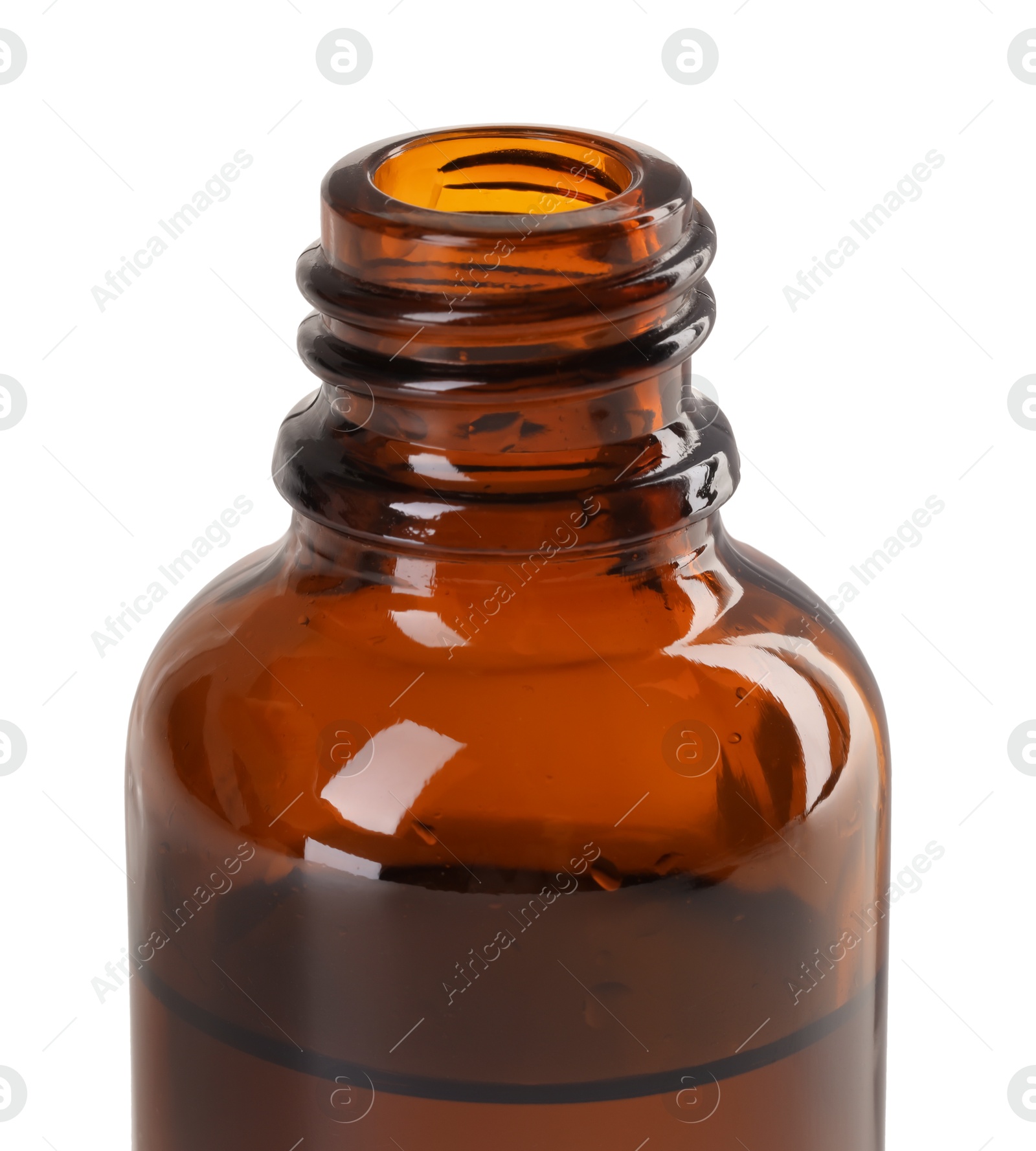 Photo of Bottle of essential oil isolated on white