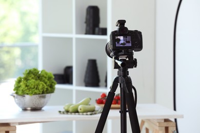 Shooting food in photo studio with professional equipment