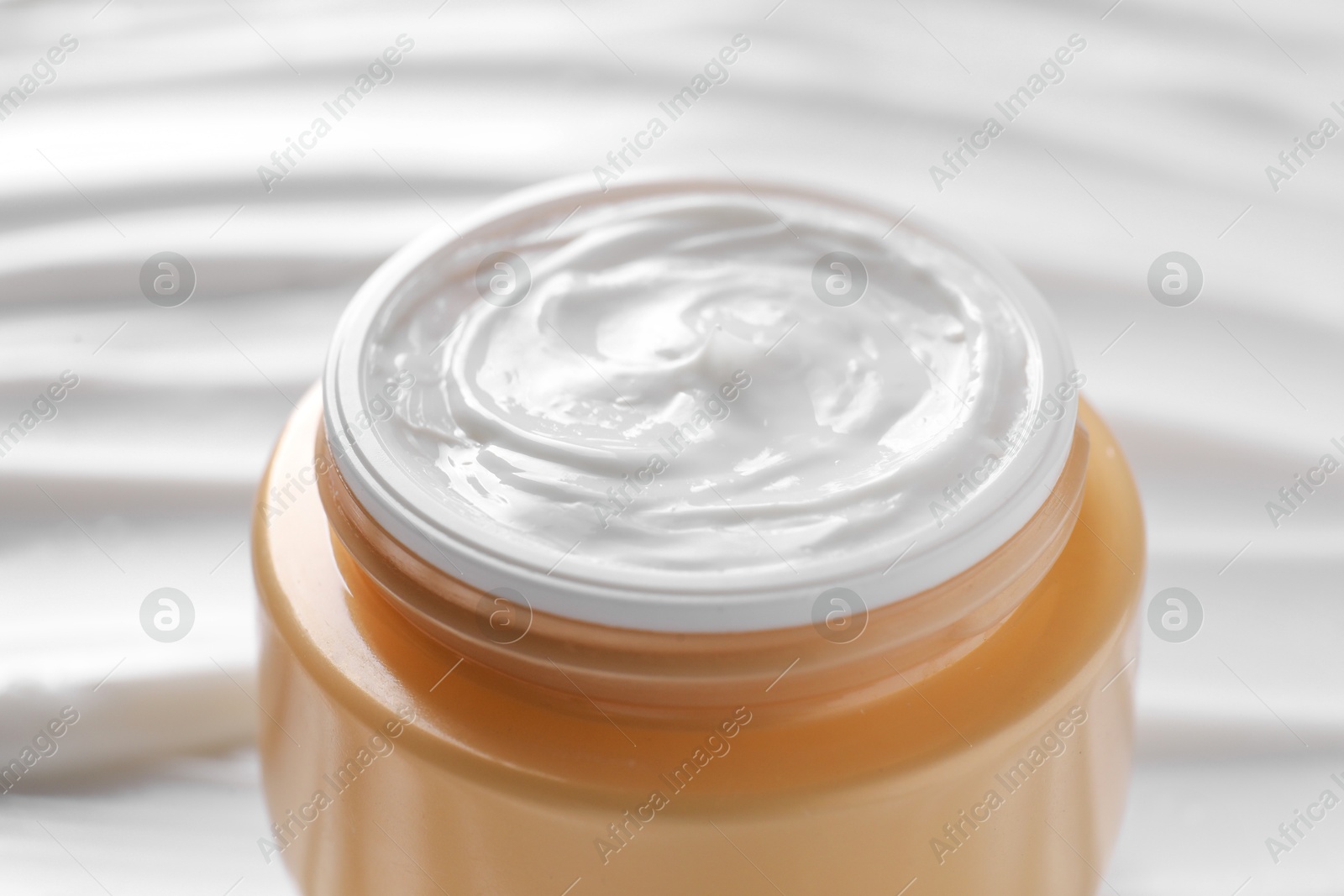 Photo of Jar with face cream, closeup. Cosmetic product