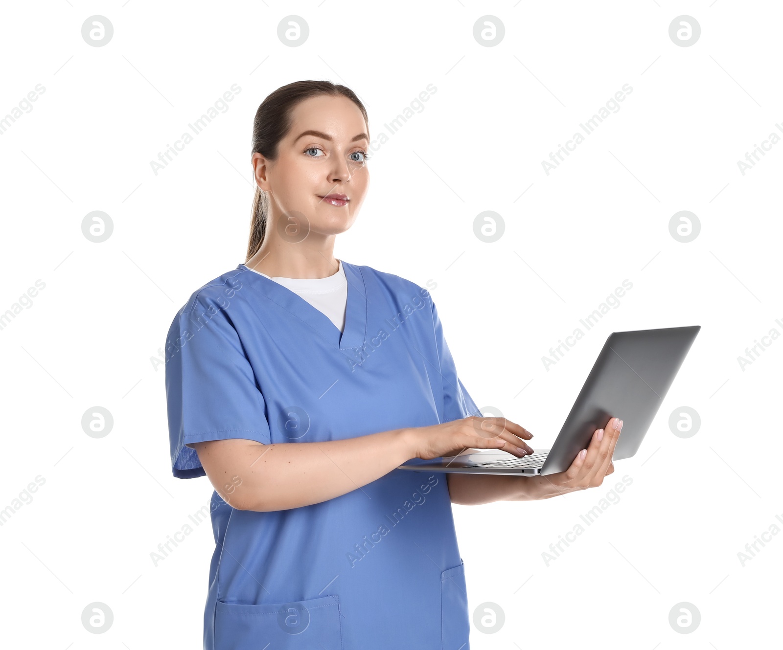 Photo of Professional nurse working with laptop on white background