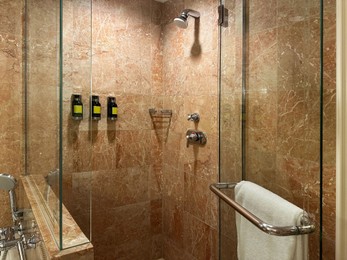 Luxury hotel interior. Stylish bathroom with care products