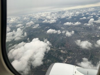 Photo of Picturesque view through plane window during flight