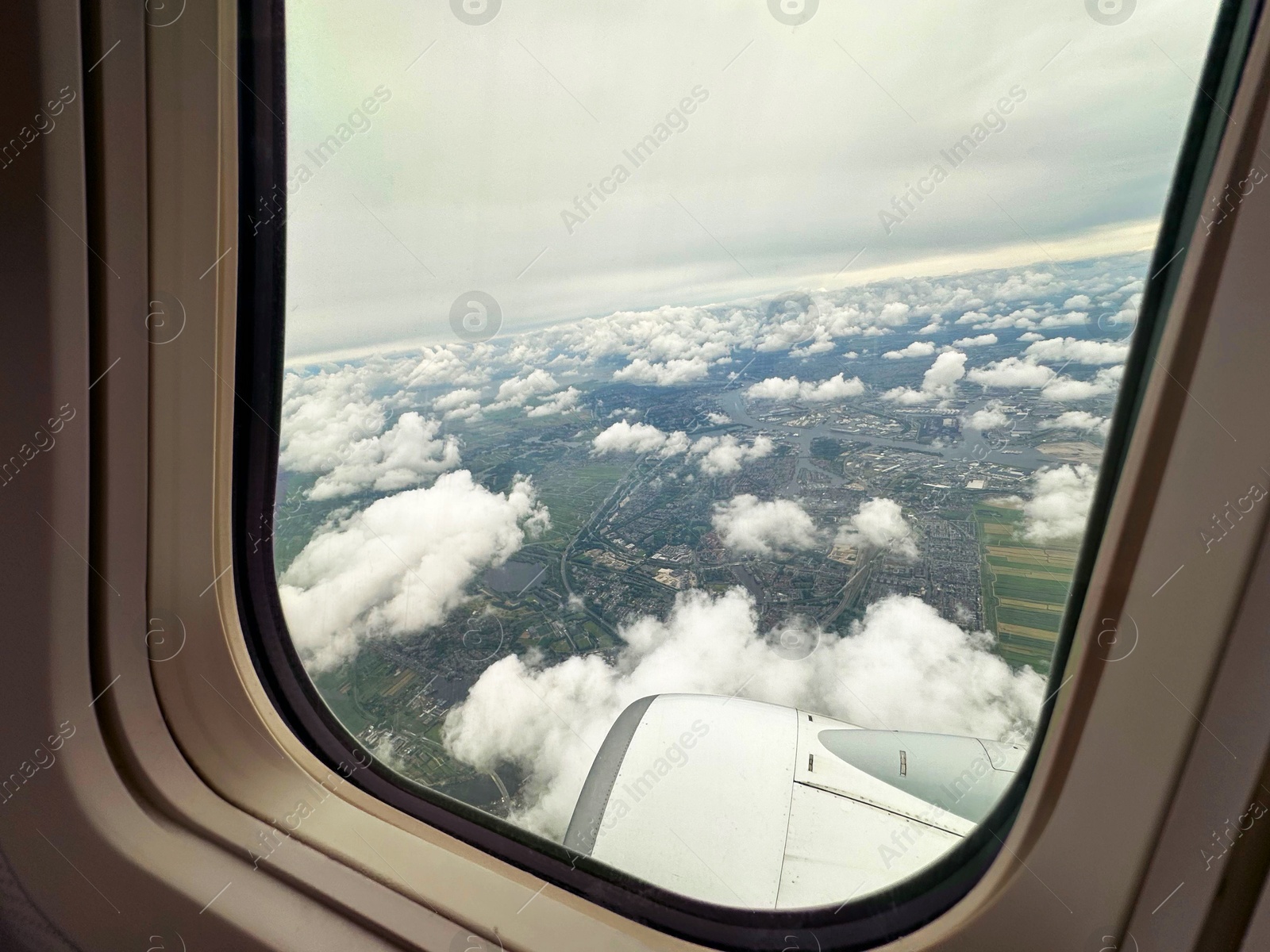 Photo of Picturesque view through plane window during flight