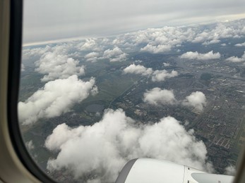 Photo of Picturesque view through plane window during flight