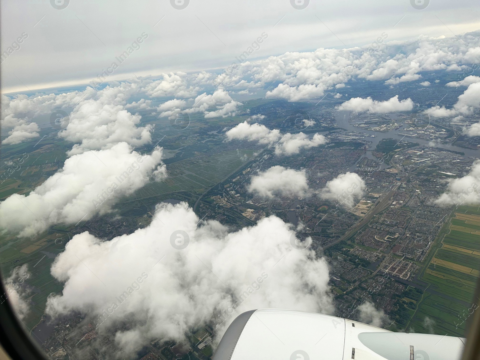 Photo of Picturesque view through plane window during flight