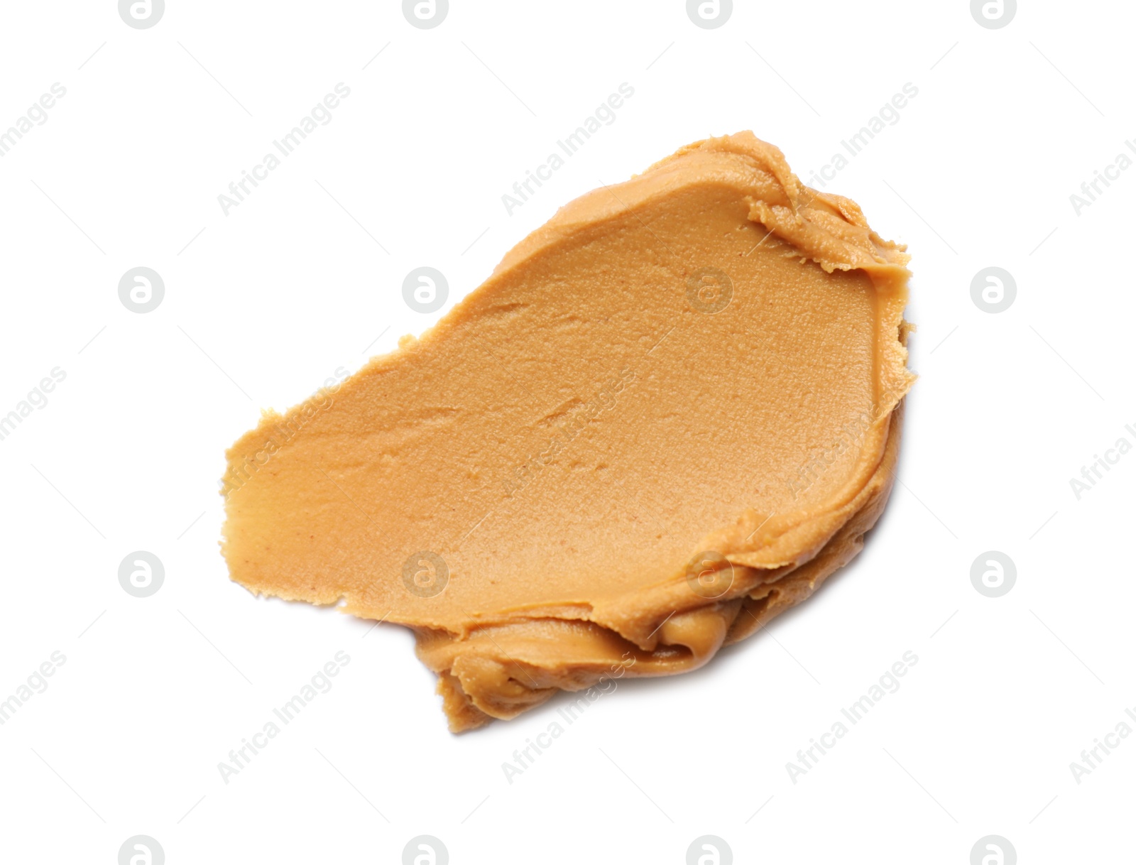 Photo of Tasty peanut butter on white background, top view