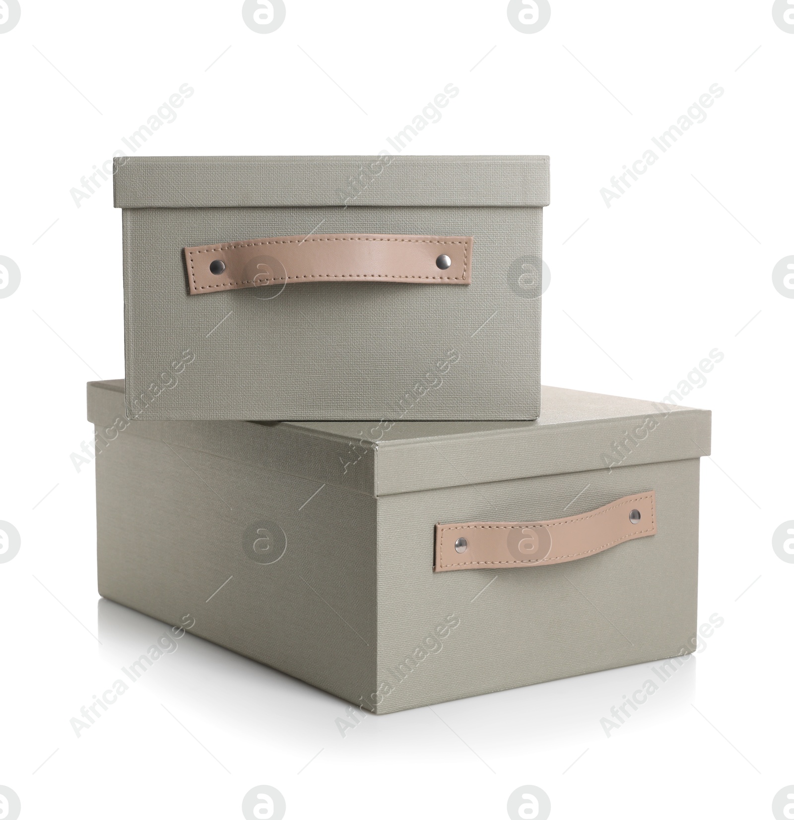 Photo of Two gray boxes with lids isolated on white