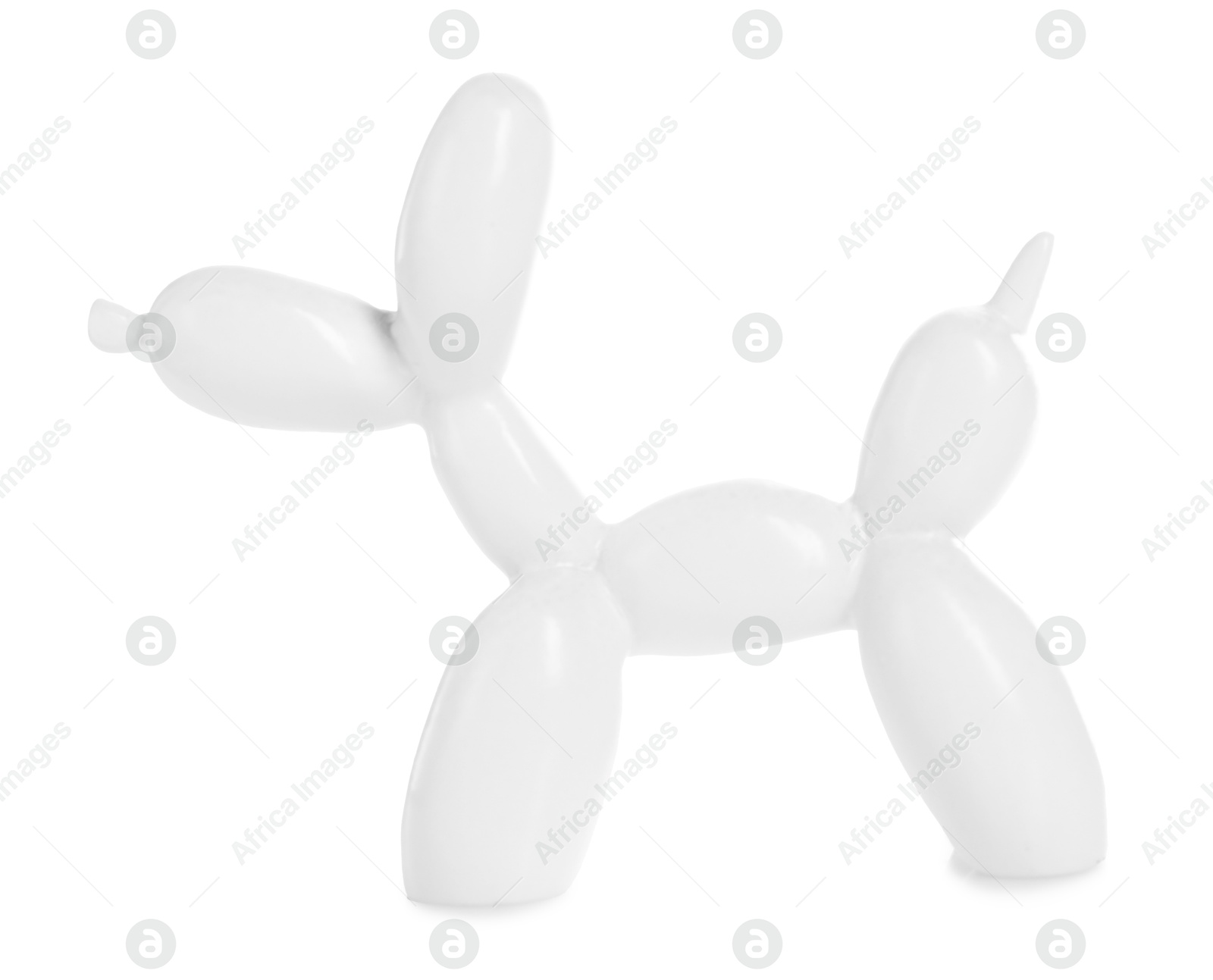 Photo of Decorative figure in shape of balloon dog isolated on white