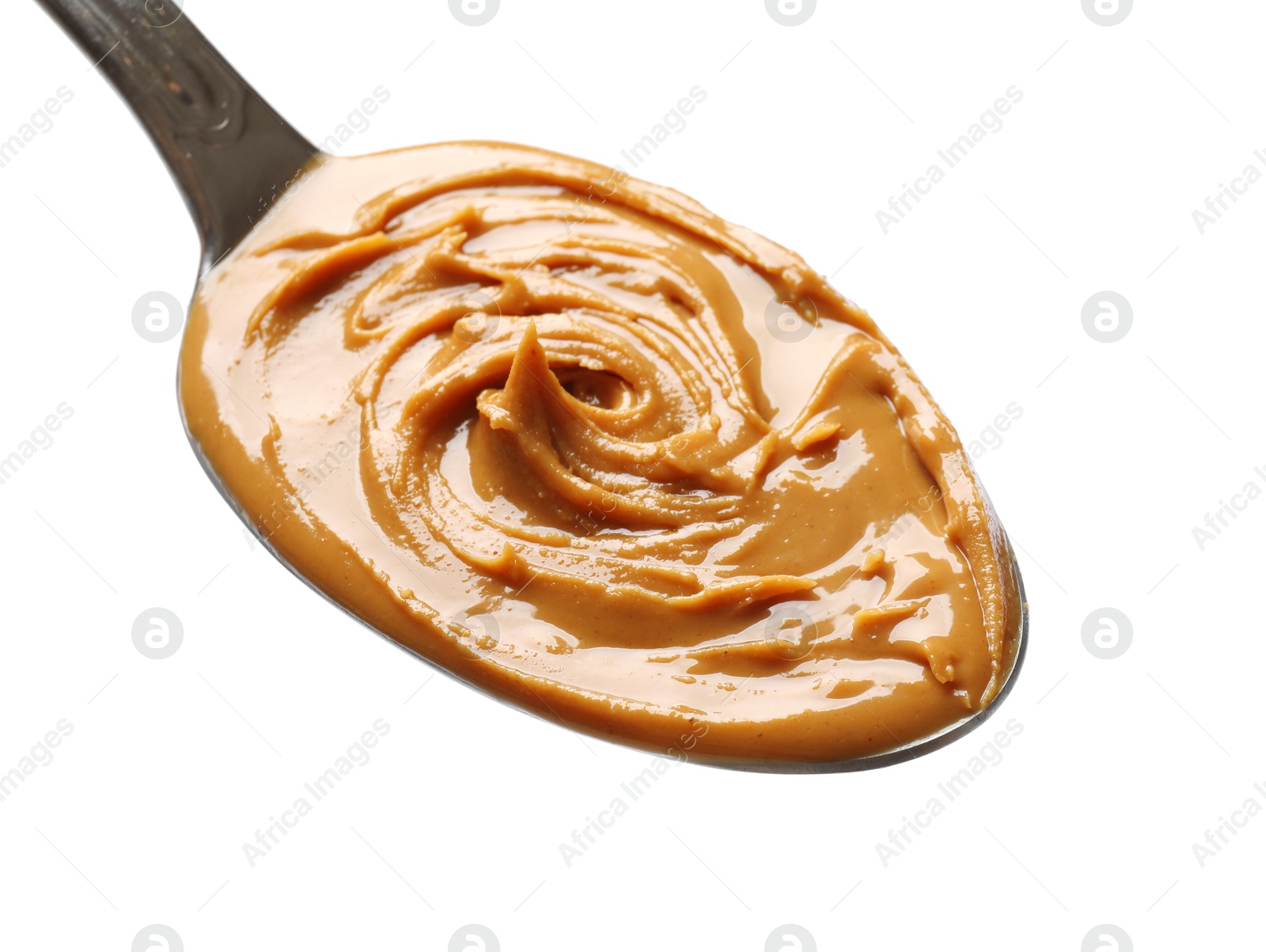 Photo of Tasty peanut butter in spoon isolated on white