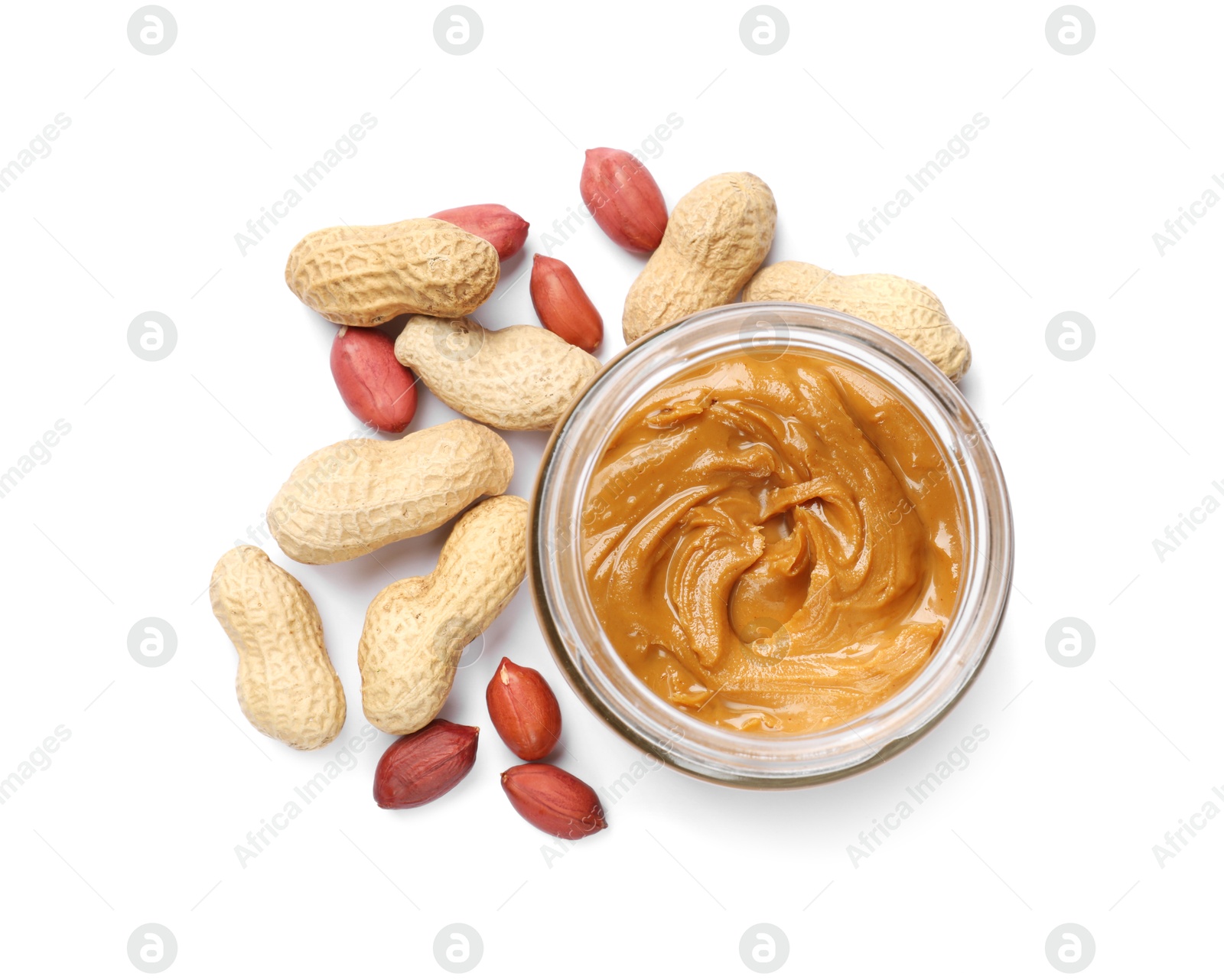 Photo of Tasty peanut butter and nuts isolated on white, top view