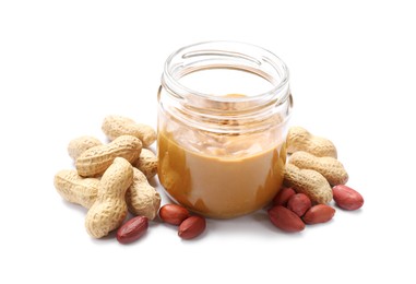 Photo of Tasty peanut butter and nuts isolated on white