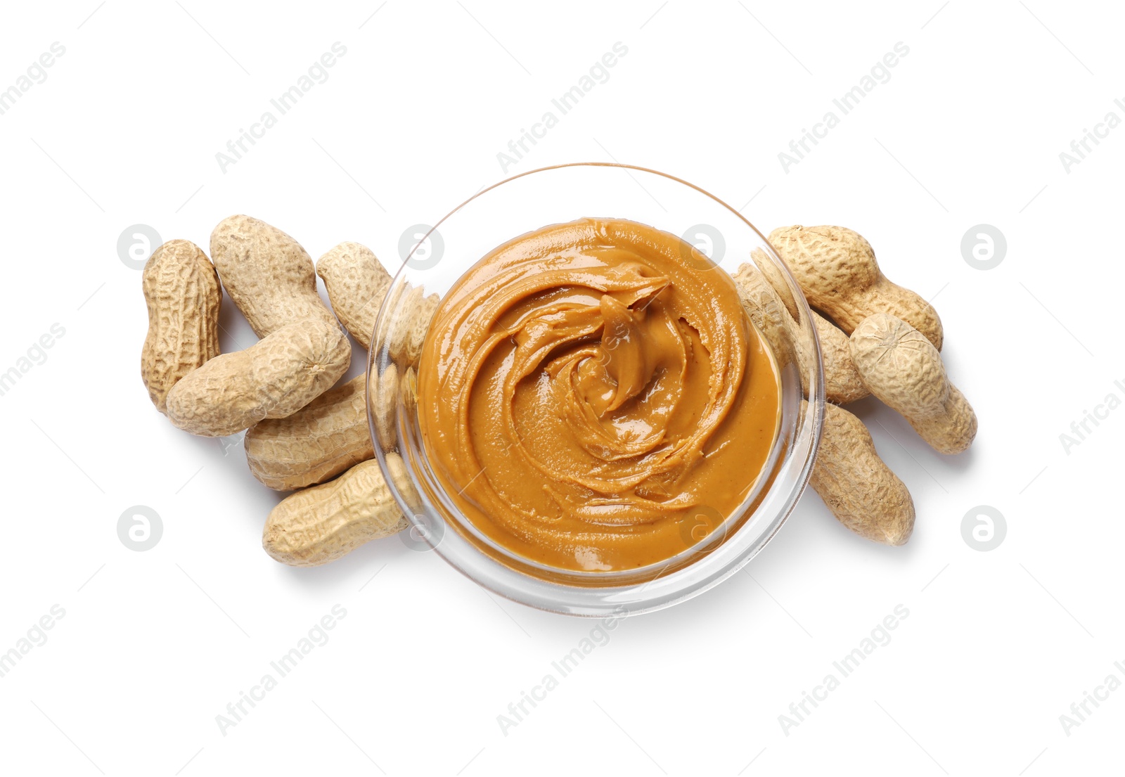 Photo of Tasty peanut butter and nuts isolated on white, top view