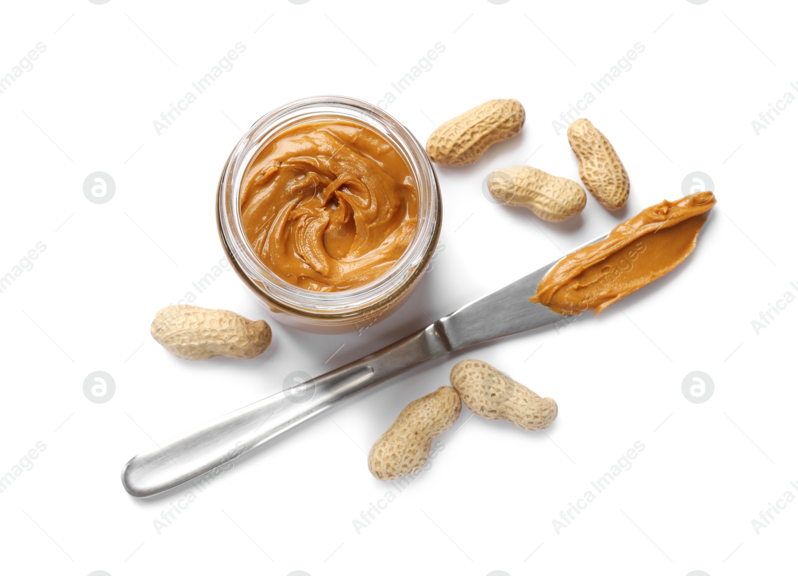 Photo of Tasty peanut butter and nuts isolated on white, top view