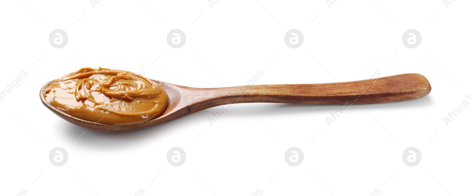 Photo of Tasty peanut butter in spoon isolated on white