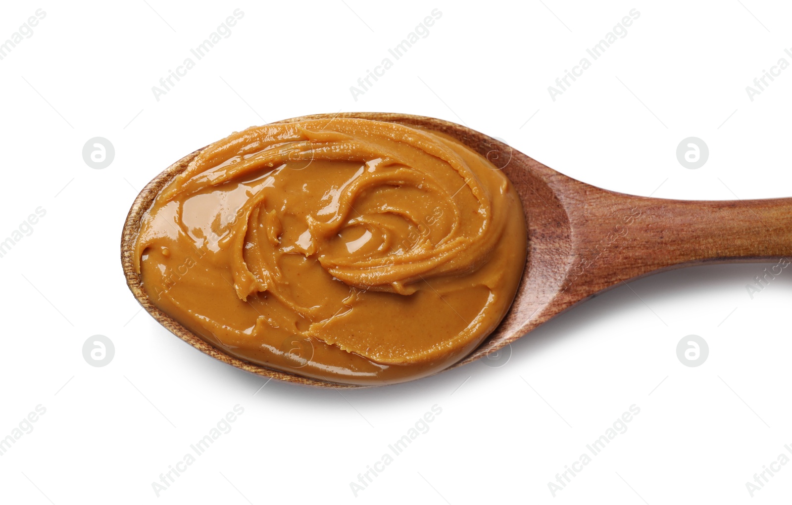 Photo of Tasty peanut butter in spoon isolated on white, top view