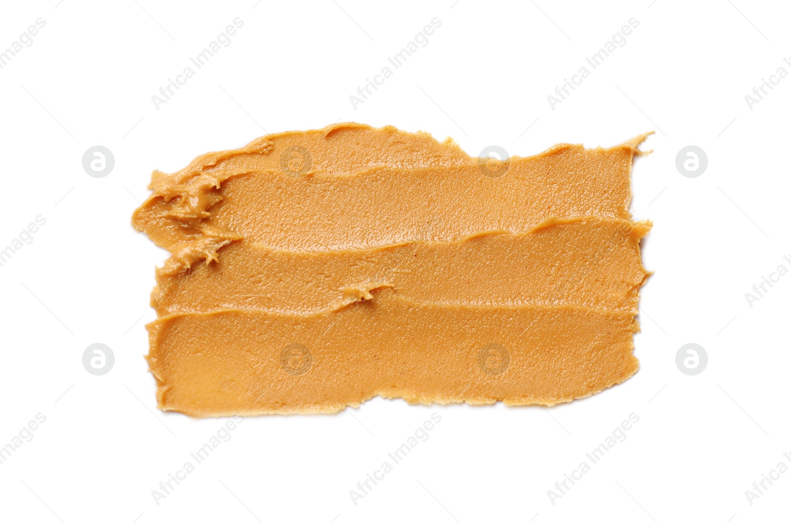 Photo of Tasty peanut butter isolated on white, top view