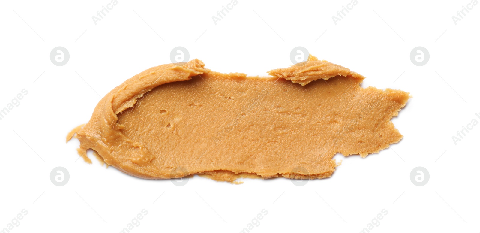 Photo of Tasty peanut butter isolated on white, top view