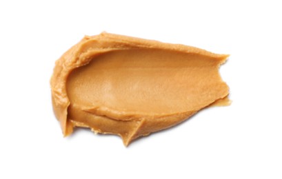 Photo of Tasty peanut butter isolated on white, top view