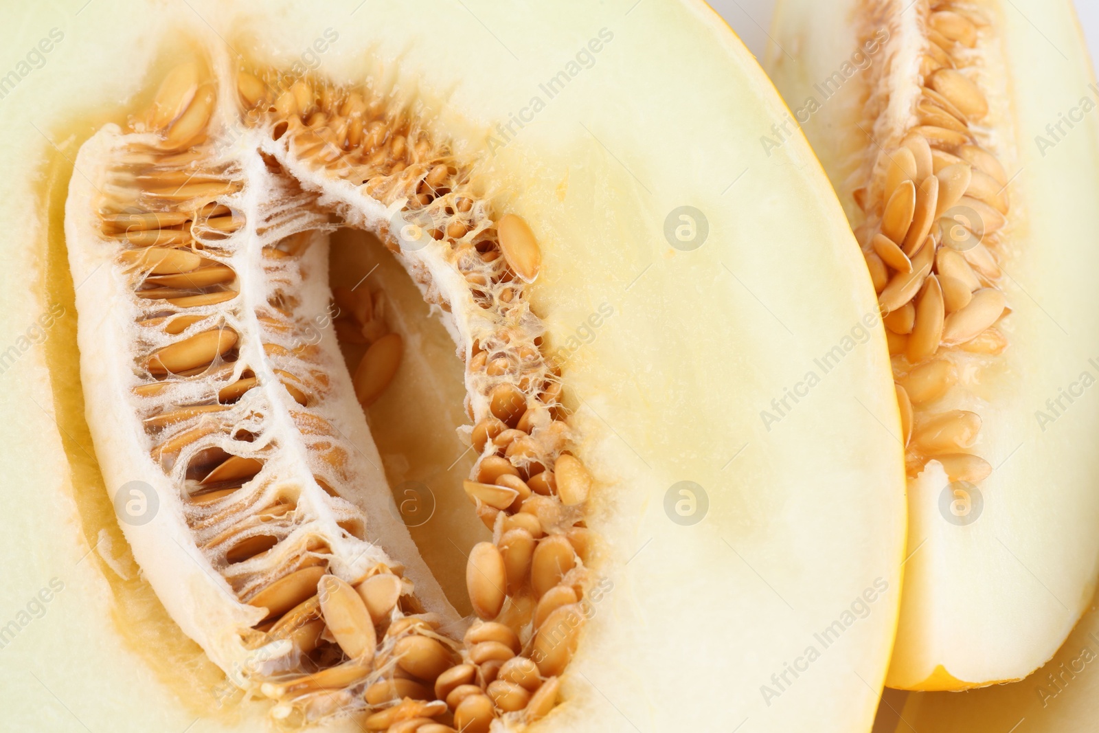 Photo of Pieces of ripe melon as background, closeup