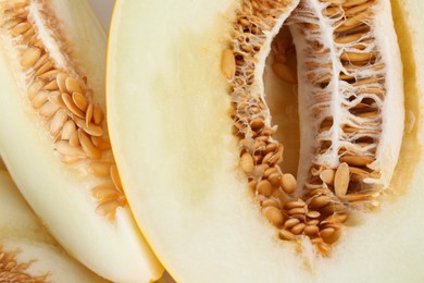 Photo of Pieces of ripe melon as background, closeup