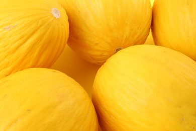 Photo of Many whole ripe melons as background, closeup