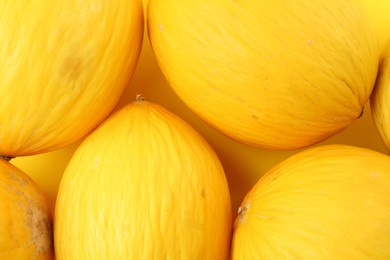 Photo of Many whole ripe melons as background, closeup