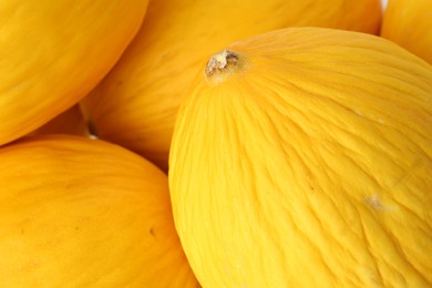 Photo of Many whole ripe melons as background, closeup