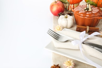 Photo of Beautiful table setting with autumnal decor on white background