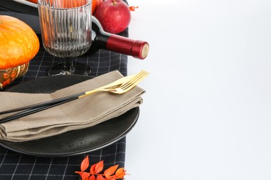 Beautiful table setting with autumnal decor on white background