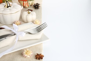 Photo of Beautiful table setting with autumnal decor on white background