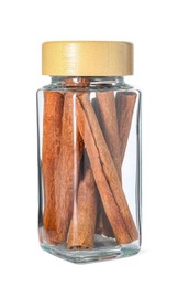 Photo of Cinnamon sticks in glass jar isolated on white