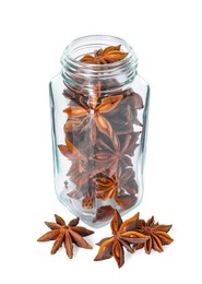 Photo of Anise stars in glass jar isolated on white