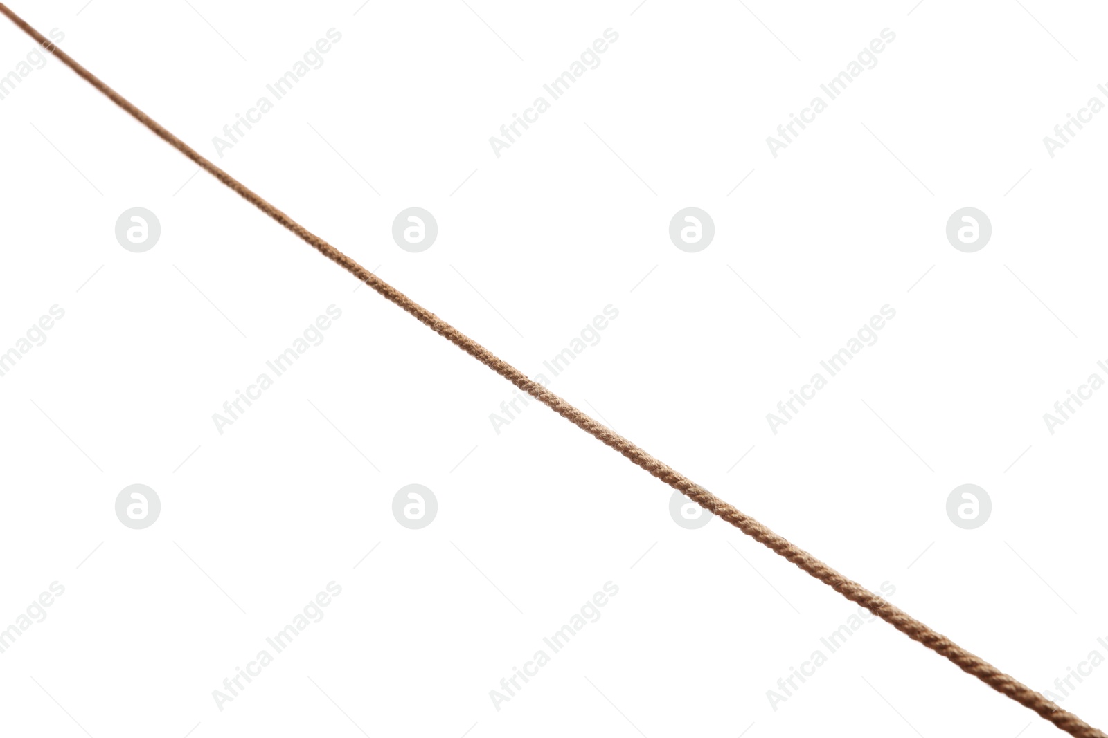 Photo of One brown braided rope isolated on white