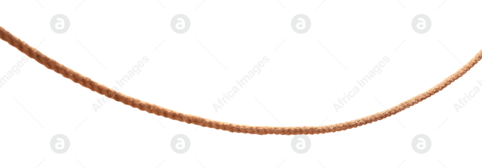 Photo of One brown braided rope isolated on white