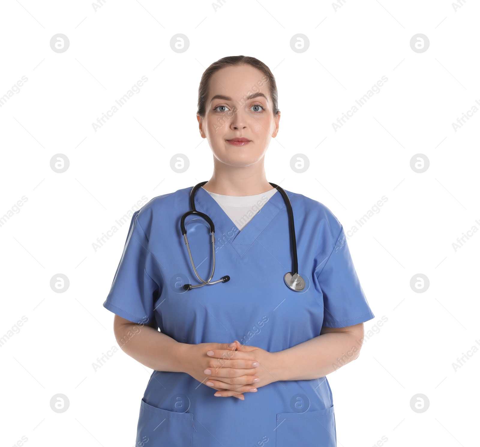 Photo of Portrait of professional nurse with stethoscope on white background