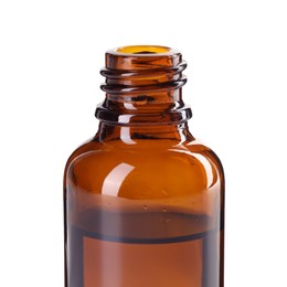 Photo of Bottle of essential oil isolated on white