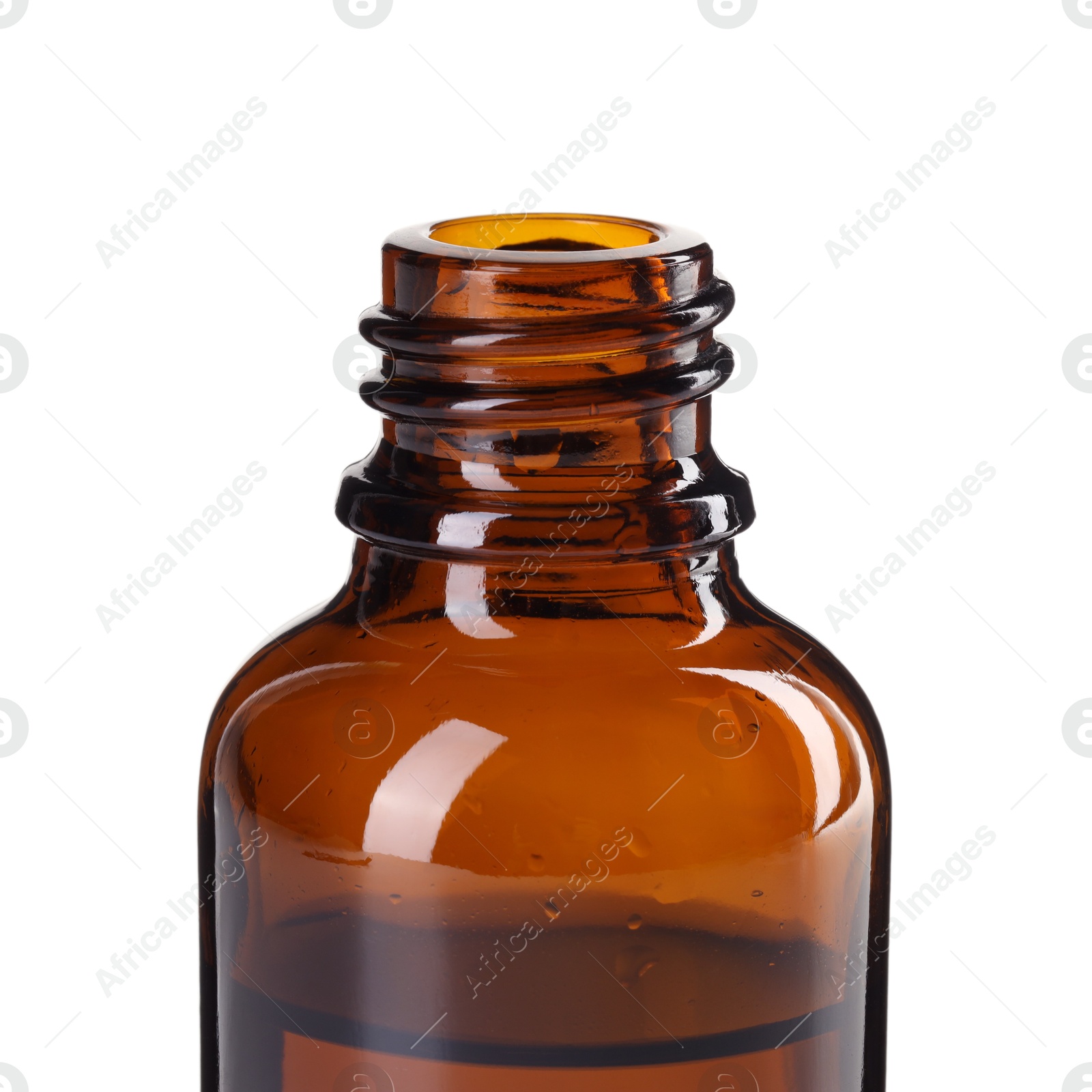 Photo of Bottle of essential oil isolated on white