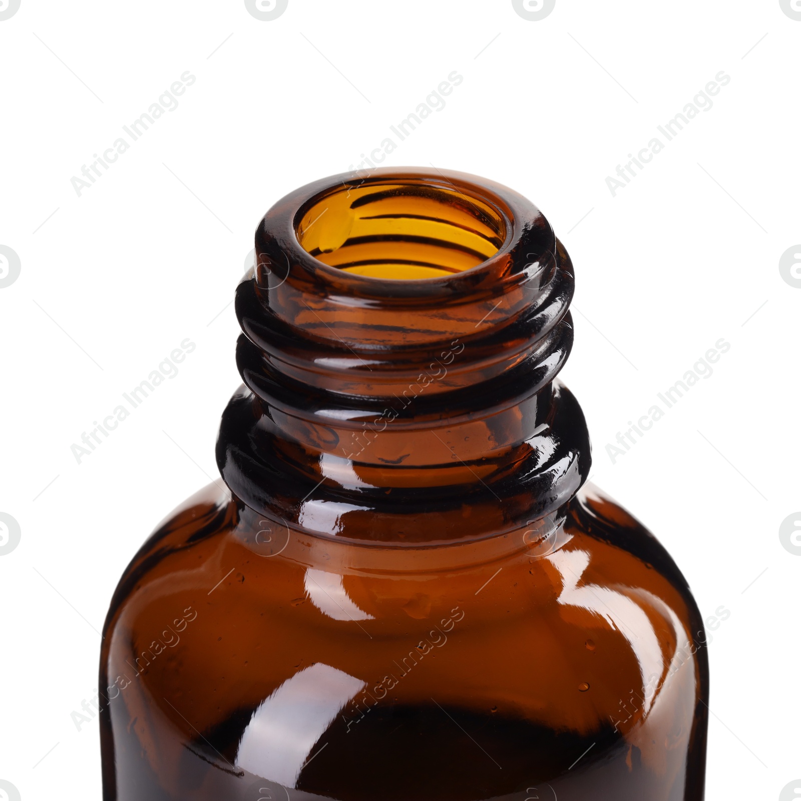 Photo of Bottle of essential oil isolated on white