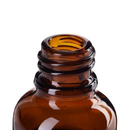 Photo of Bottle of essential oil isolated on white