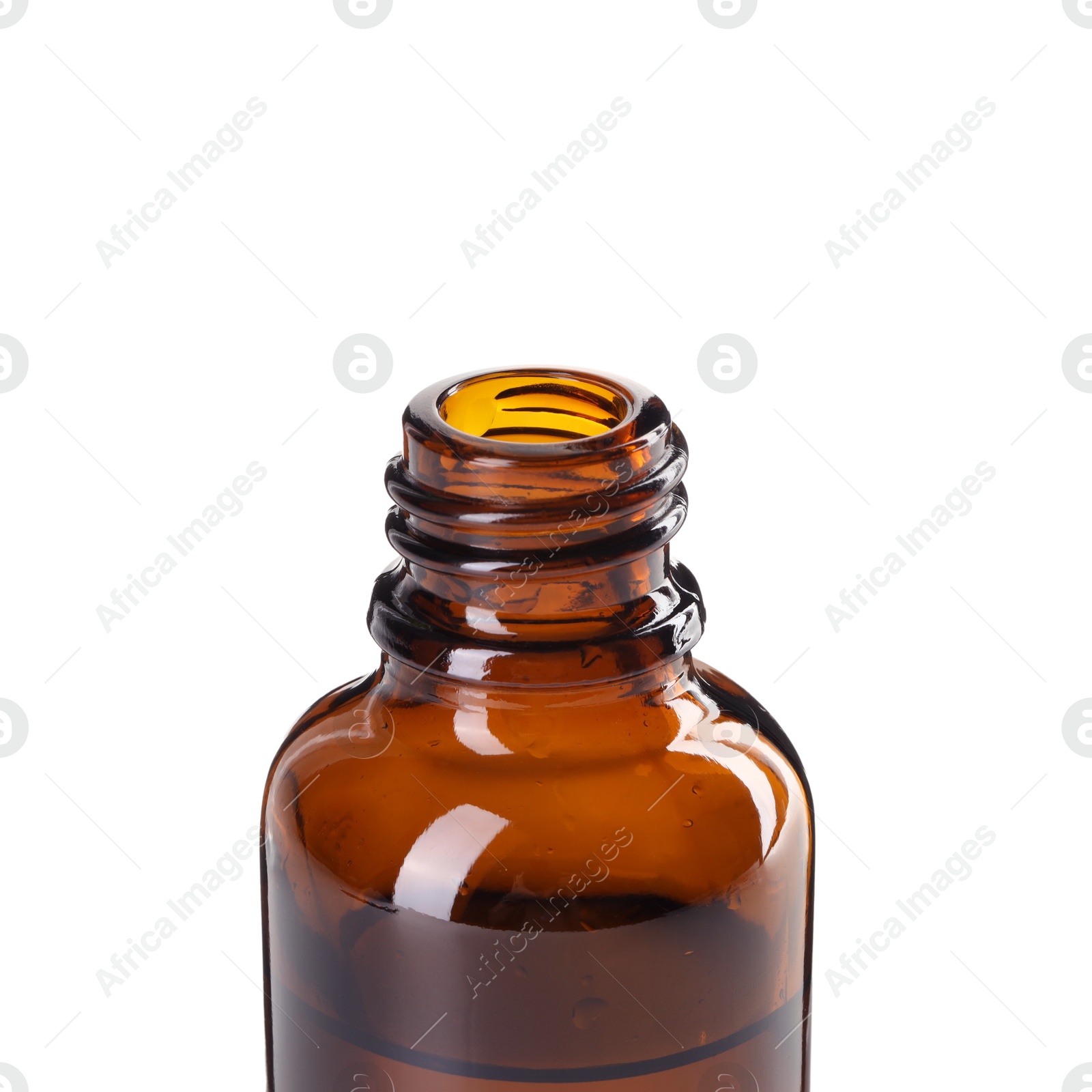 Photo of Bottle of essential oil isolated on white