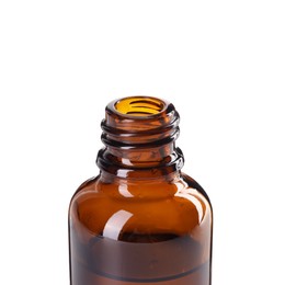 Photo of Bottle of essential oil isolated on white