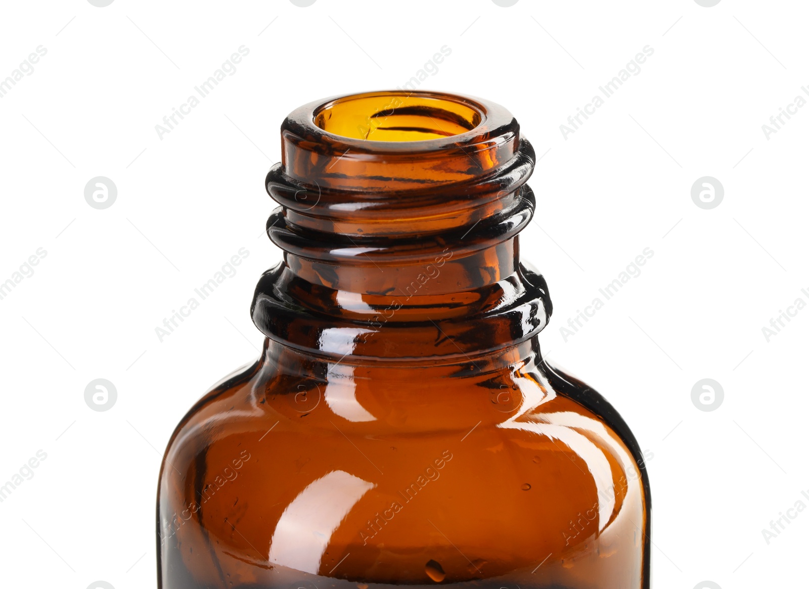 Photo of Bottle of essential oil isolated on white