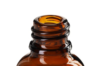 Photo of Bottle of essential oil isolated on white