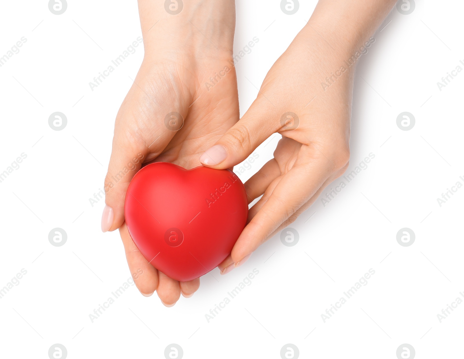 Photo of Woman with red decorative heart at white table, top view. Space for text