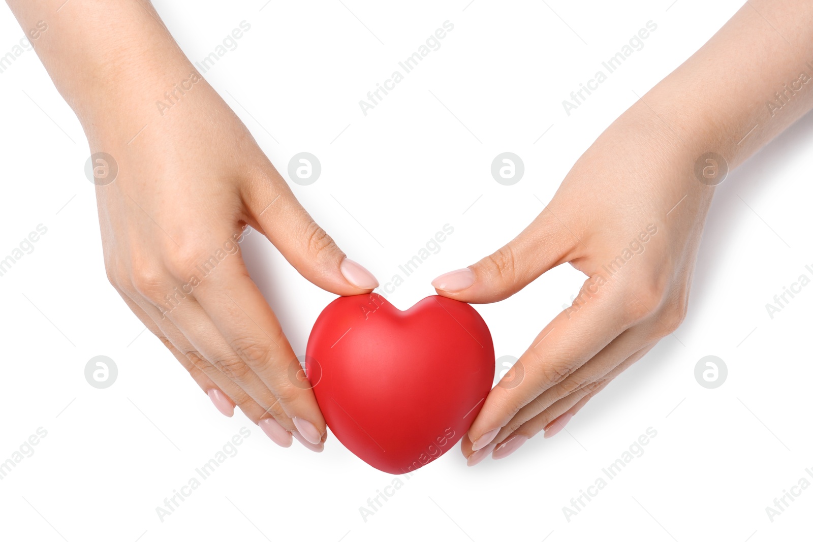 Photo of Woman with red decorative heart at white table, top view