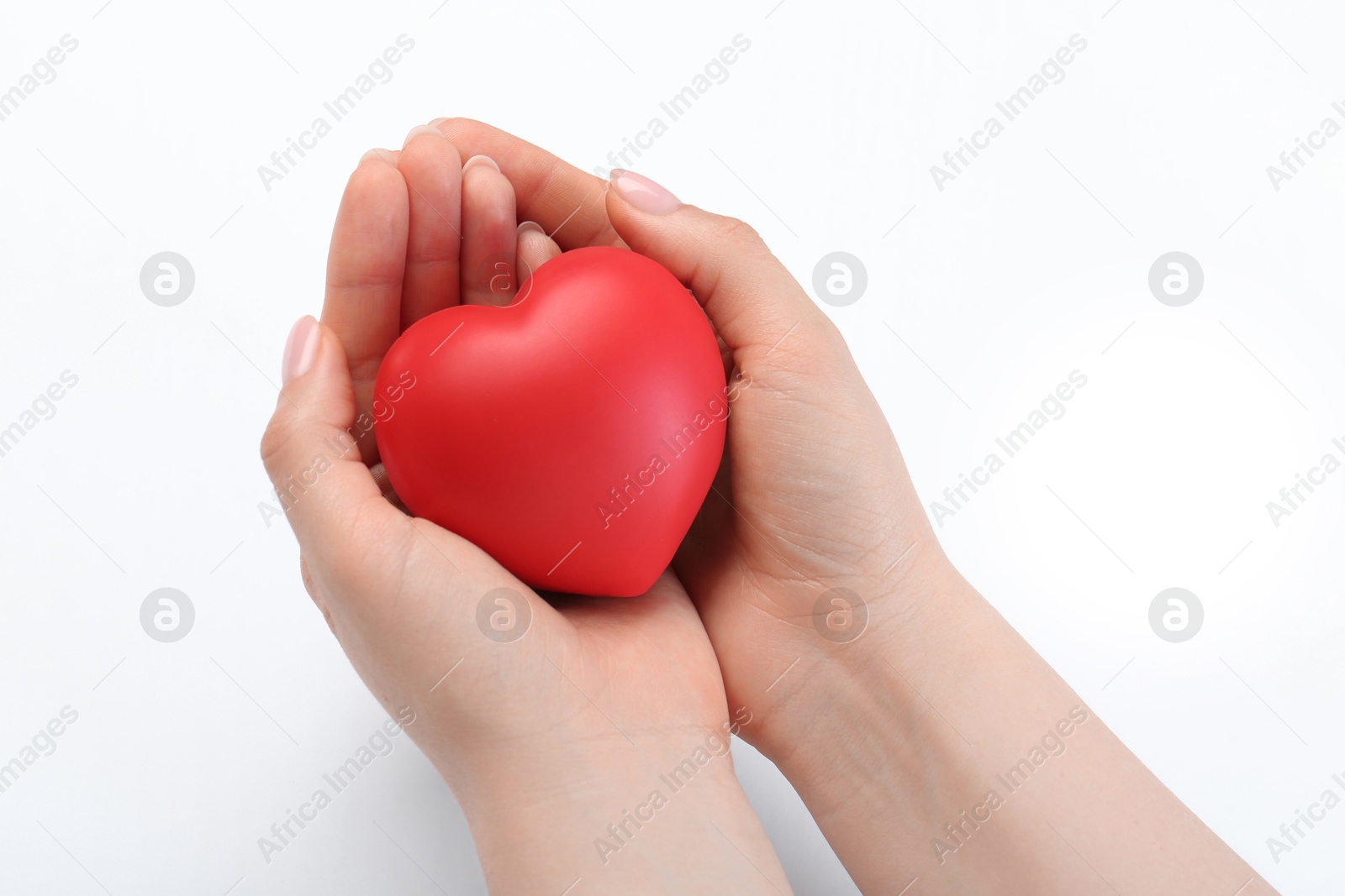 Photo of Woman holding red heart on white background, closeup