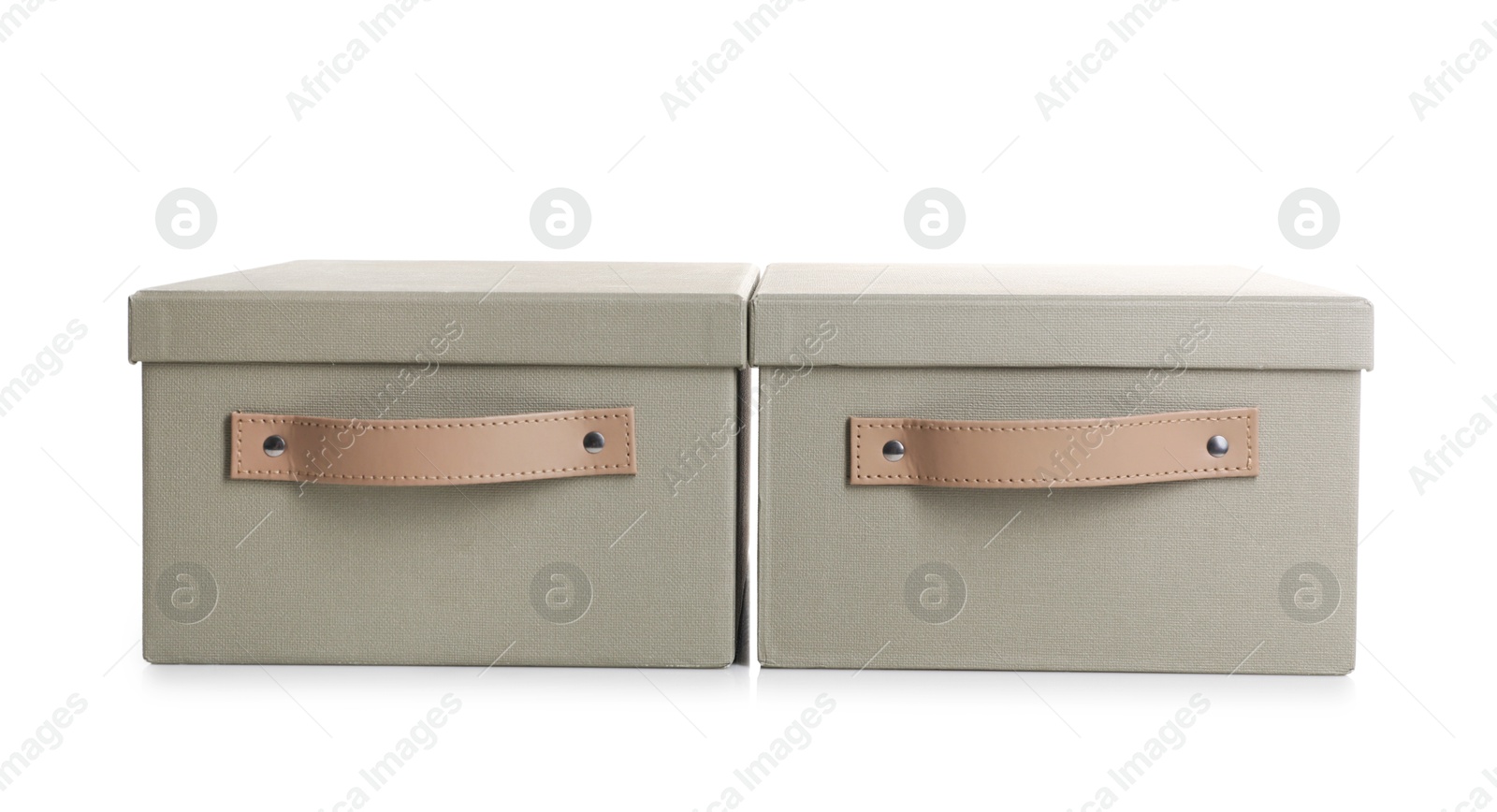 Photo of Two gray boxes with lids isolated on white