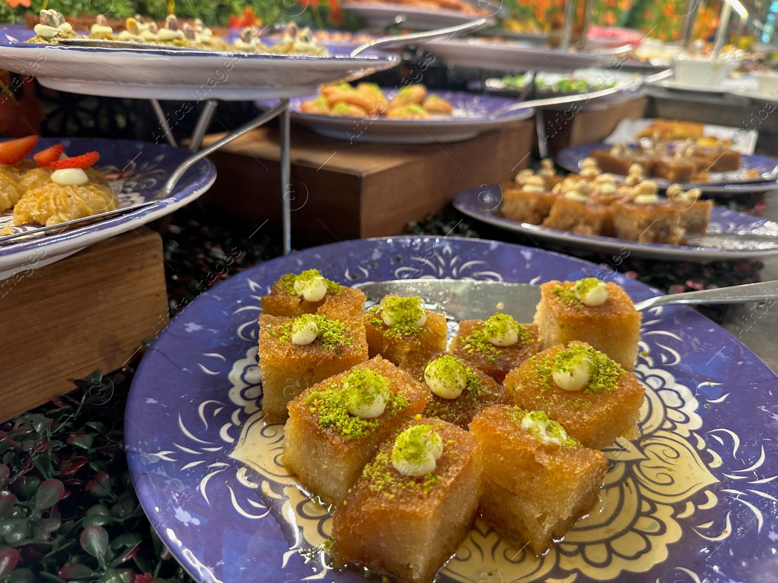 Photo of Different tasty desserts on table. Buffet service